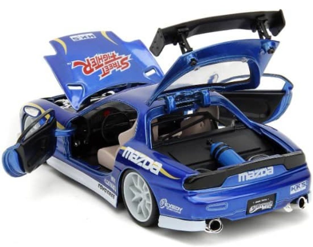 Jada- Street Fighter II, Chun-Li, Mazda RX-7 de 1993, Escala 1:24 , en Metal, Giro de Ruedas, Apertura de Puertas y Figura de Chun-Li (253255062)