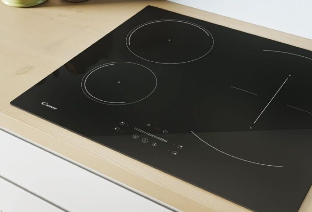 Candy CTP64SC/E1 - Placa de inducción, control deslizante mono, 4 zonas de cocción, temporizador, seguridad infantil, sin marco, cristal negro