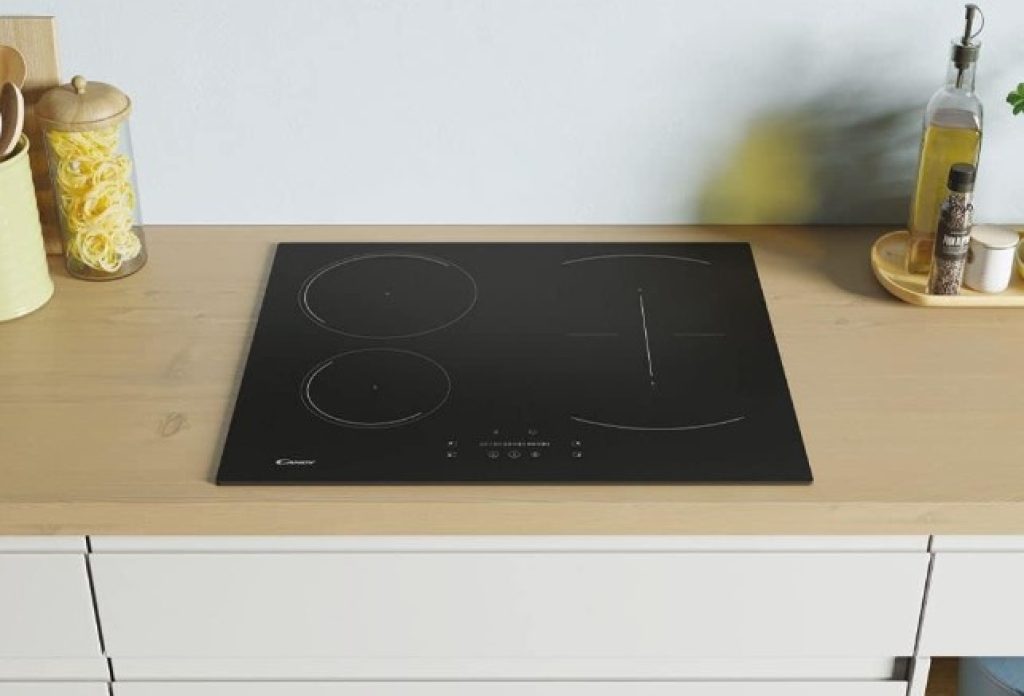 Candy CTP64SC/E1 - Placa de inducción, control deslizante mono, 4 zonas de cocción, temporizador, seguridad infantil, sin marco, cristal negro